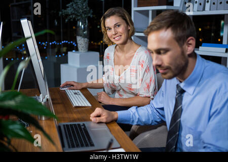 Businesspeople working in office Stock Photo