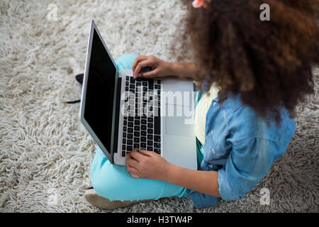 Girl using laptop Stock Photo
