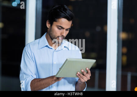 Businessman using digital tablet Stock Photo