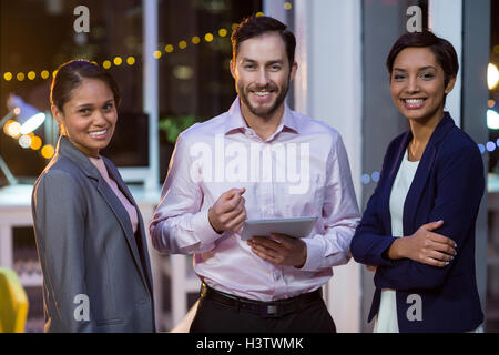Businesspeople using digital tablet Stock Photo