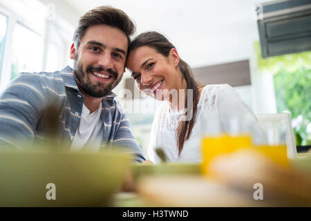 Portrait of couple having breakfast Stock Photo