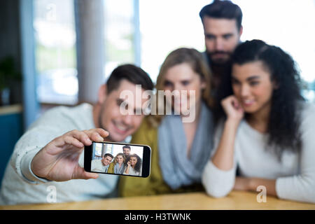 Group of friends taking a selfie Stock Photo