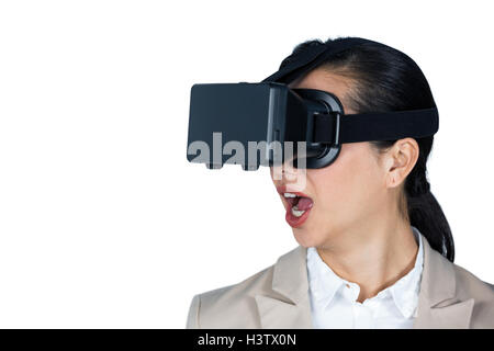 Businesswoman using virtual reality headset Stock Photo