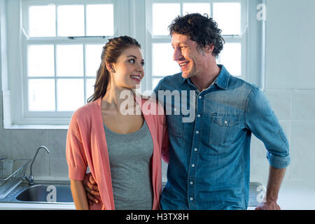 Couple smiling and looking at each other Stock Photo