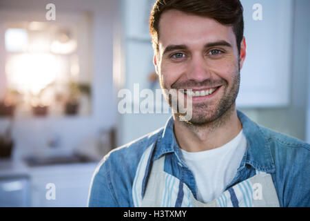 Man standing in the kitchen Stock Photo