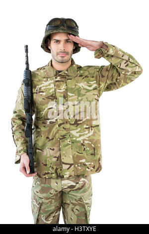 Portrait of soldier holding a rifle and saluting Stock Photo - Alamy