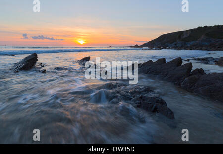 Sunset at Dollar Cove near Gunwalloe Stock Photo