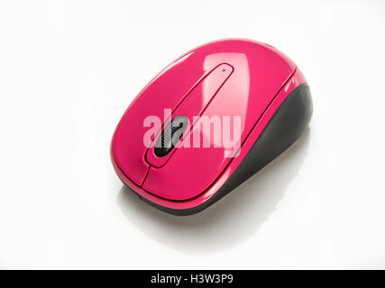 Small wireless pink mouse for portable laptop Stock Photo