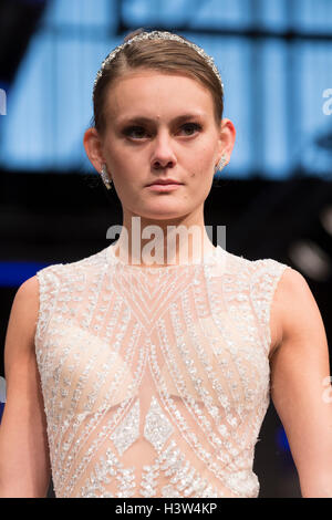 Model walks runway for Israeli designers show by Birenzweig during New York Bridal week at Pier 94 Stock Photo