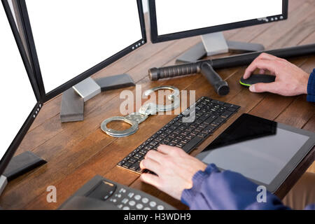 Hands of security officer using computer Stock Photo