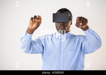 Man using virtual reality headset Stock Photo