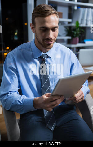 Businessman using digital tablet Stock Photo