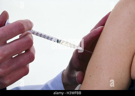 Doctor, patient, detail, syringe, intramuscular syringe, injection, injektieren, inoculation, inoculate, upper arm, prophylaxis, drug contribution, medicine, treatment, precaution Stock Photo