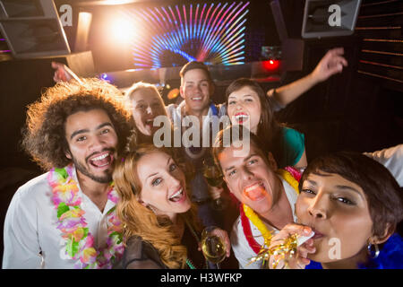 Group of friends having fun in bar Stock Photo