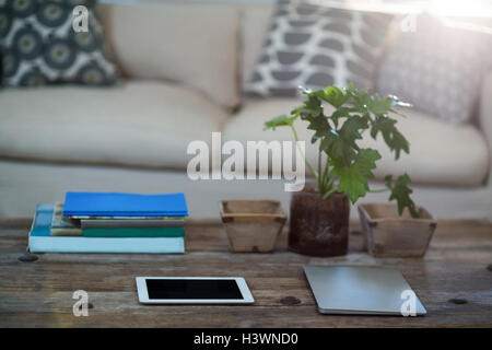 Digital tablet and laptop on a table Stock Photo