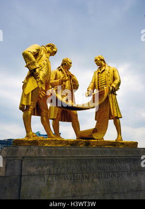 Gold statue titled 'Boulton, Murdoch and Watt' by William Bloye (1890-1975) an English sculptor. The statue is of three of Birmingham's most famous figures; Matthew Boulton (1728-1809), William Murdoch (1754-1839), and James Watt (1736-1819). Dated 20th Century Stock Photo