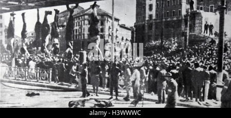 Photograph of the hanging bodies of Mussolini and Petacci in the Piazzale Loreto, Milan. Dated 20th Century Stock Photo