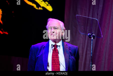 Bristol, UK. October 13th, 2016. Guest speaker Sir David Attenborough addresses nominees and attendees at the Wildscreen Panda Awards 2016 held at Bristol's Colston Hall. The Wildscreen Panda Awards have sat at the heart of the Wildscreen Festival since they were presented at the first Festival in 1982 and remain the highest accolade in the wildlife film and TV industry. Credit:  Chris Cooper/Alamy Live News Stock Photo