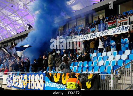 Budapest, Hungary. 13th Oct, 2016.  The ultra fans of MTK Budapest watch the game during the Stadium Opening match between MTK Budapest and Sporting CP at Nandor Hidegkuti Stadium on October 13, 2016 in Budapest, Hungary. Credit:  Laszlo Szirtesi/Alamy Live News Stock Photo