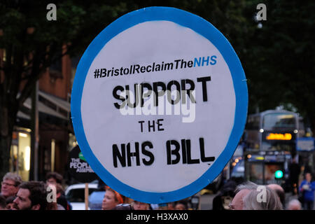 Bristol, UK. 13th October, 2016. Protesters march through the city streets during the evening rush hour to show their support for the National Health Service. The march was organised by Bristol People’s Assembly to demonstrate public support for NHS workers and opposition to the government’s plans for the service. Credit:  Keith Ramsey/Alamy Live News Stock Photo