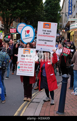 Bristol, UK. 13th October, 2016. Protesters march through the city streets during the evening rush hour to show their support for the National Health Service. The march was organised by Bristol People’s Assembly to demonstrate public support for NHS workers and opposition to the government’s plans for the service. Credit:  Keith Ramsey/Alamy Live News Stock Photo