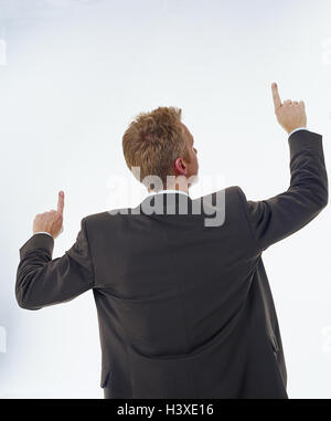 Man, young, suit, gesture, pointing, tip, back view, Men, businessman, manager, indicate, on top, point, body language, backs, near, cut out, studio, Stock Photo