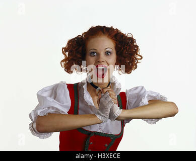 Woman, young, dirndl, gesture, is surprised, half portrait, women, joy, surprise, surprises, astonishment, astonished, studio, cut out, joy at seeing again, reunion, red-haired, pleases, hands, mouth, openly, view, camera, Stock Photo