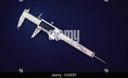 Vernier caliper tool details, made in Germany, on blue background. Stock Photo