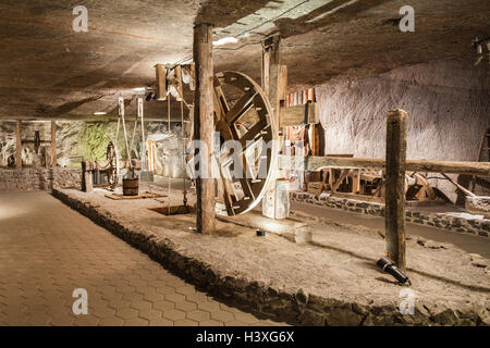 Wieliczka - Poland - April 23. One of the chambers in Wieliczka Salt Museum transformed to exhibition room with wood man made mi Stock Photo
