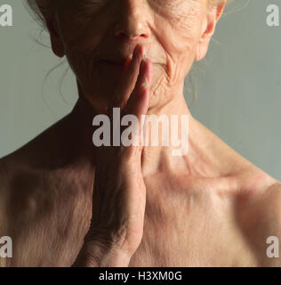 Senior, free upper part of the body, gesture, detail, very close, studio, pensioner, woman, old, shell, creased, folds, course, naturalness, old age, rest, quietly, silence, discretion, quietly, silence, secret, discretion Stock Photo