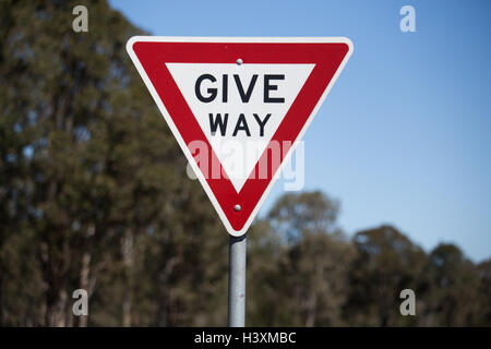 Give Way Sign, Give way or yield to oncoming traffic. Stock Photo