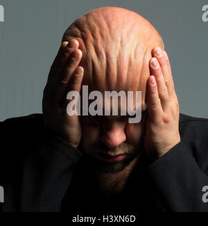 Man, bald head, hands, scalp, folds, gesture, desperation, desperation head rest on, portrait, mood, thought, situation, negatively, hopelessness, grief, worries, depression, helplessly, depresses, think despondently, unhappily, suppressed, helplessness, Stock Photo