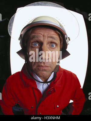 Firefighter, safety helmet, hard hat, facial play, near mb 88 A5 Stock Photo