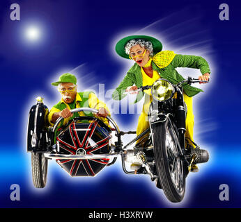 Senior couple, clothes, brightly, youthfully, motorcycle, side car, go, joy, speed Senior, senior citizens, couple, man, woman, old, senior, senior, motor sport, motorcycle driving, motorcyclist, hobby, leisure time, amusement, fun, excursion, dynamics, happy, fit, agile, studio, Composing, Stock Photo