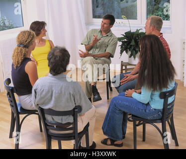 Group therapy, men, women, conversation, conversation therapy, discussion, discuss, problems, worries, grief, help, together, solve, solutions, search, find, people, young, sit, listen, psychotherapeutics, group, workgroup Stock Photo