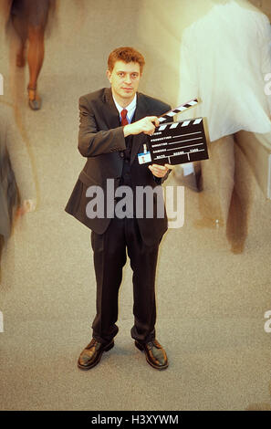Stock exchange, manager, film clapper board, trade, stock trade, stocks, stock exchange transaction, stock market, speculation, speculate, commercial stalls, man, suit, passer-by, blur, motion, helped to pull Stock Photo