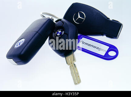 A Mercedes-Benz key fob laying on a wood surface Stock Photo - Alamy