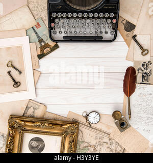 Antique typewriter and vintage office accessories on wooden table. Flat lay still life Stock Photo