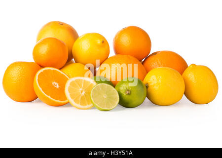 Cutout of a collection of citrus fruits including oranges, lemons, grapefruit, and lime plus slices. Stock Photo