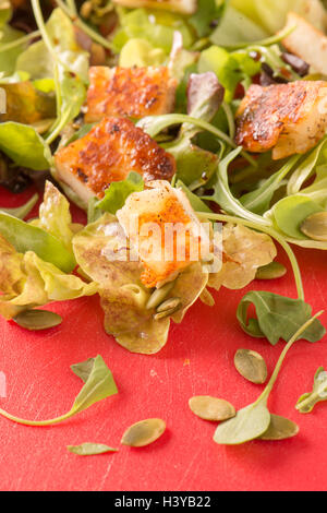 Salad with halloumi cheese in close up. Vegetarian healthy food. Stock Photo