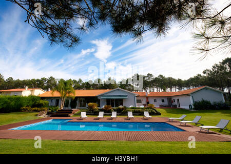 Big house with outdoor swimming pool Stock Photo