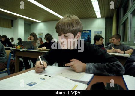 School class, schoolboy, learn, concentration, school, classroom, lessons, children, boys, girls, old person, 12-13 years, attention, carefully, interest, interests, knowledge, information, inform, learn, read, capacity, education, inside Stock Photo