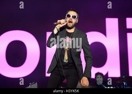 BENICASSIM, SPAIN - JULY 18: Tom Meighan, singer of Kasabian (rock band), performs at FIB Festival on July 18, 2014 in Benicassim, Spain. Stock Photo