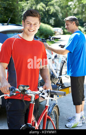 Two Men Going On Cycle Ride Together Stock Photo - Alamy
