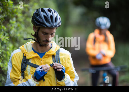Male biker with backpack Stock Photo