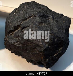 A sample of Basalt, a dark-coloured, fine-grained, igneous rock ...