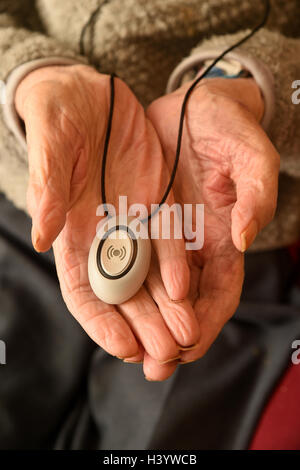 Emergency call button, emergency alarm button, remote assistance alarm for elderly people Stock Photo