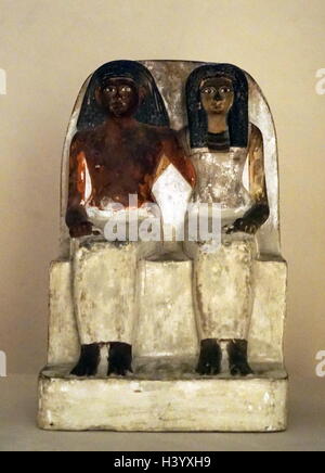 Painted limestone statue of an unnamed man and his wife from a Stock ...