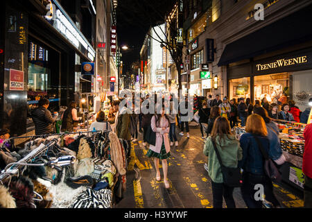 Streets stalls selling various fashion items in the evening in the popular shopping district of Myeongdong in Seoul, Korea Stock Photo