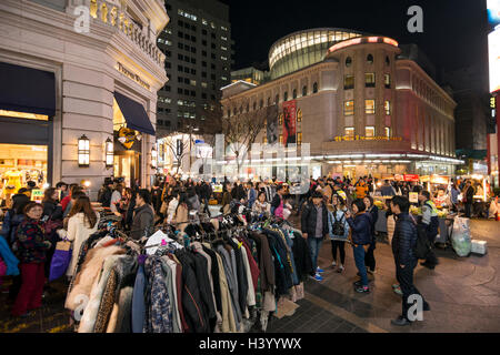 Streets stalls selling various fashion items in the evening in the popular shopping district of Myeongdong in Seoul, Korea Stock Photo